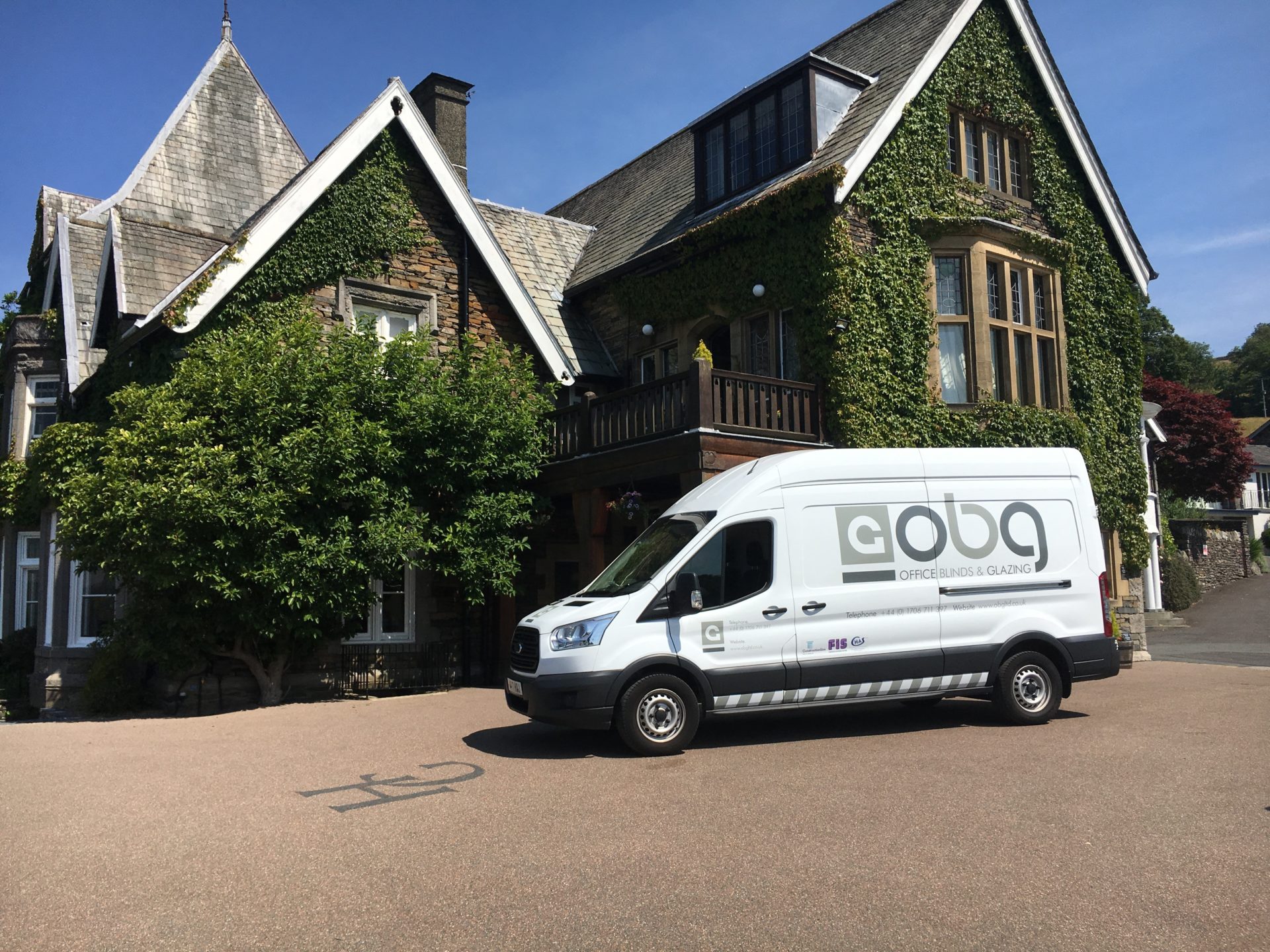 OBG van outside of house